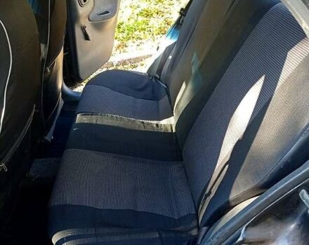 Черный Дэу Ланос, объемом двигателя 1.5 л и пробегом 365 тыс. км за 2000 $, фото 6 на Automoto.ua