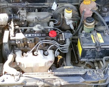 Черный Дэу Ланос, объемом двигателя 1.5 л и пробегом 171 тыс. км за 1600 $, фото 10 на Automoto.ua