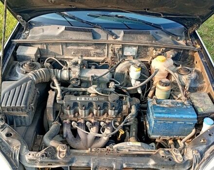 Черный Дэу Ланос, объемом двигателя 1.5 л и пробегом 230 тыс. км за 1500 $, фото 6 на Automoto.ua