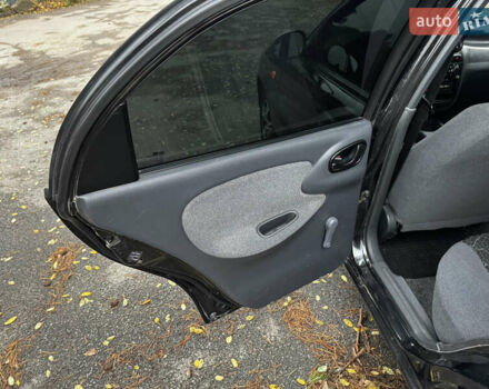 Чорний Деу Ланос, об'ємом двигуна 1.5 л та пробігом 220 тис. км за 2199 $, фото 14 на Automoto.ua