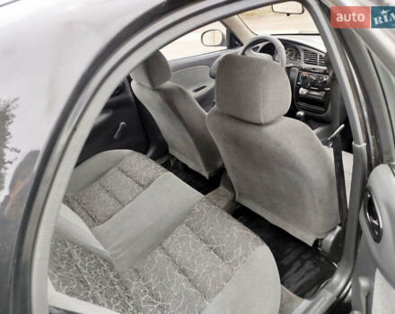 Черный Дэу Ланос, объемом двигателя 1.5 л и пробегом 350 тыс. км за 1800 $, фото 8 на Automoto.ua