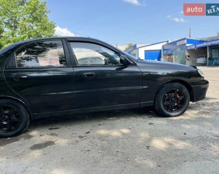 Черный Дэу Ланос, объемом двигателя 1.5 л и пробегом 300 тыс. км за 2400 $, фото 25 на Automoto.ua