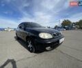 Чорний Деу Ланос, об'ємом двигуна 1.6 л та пробігом 137 тис. км за 3900 $, фото 1 на Automoto.ua