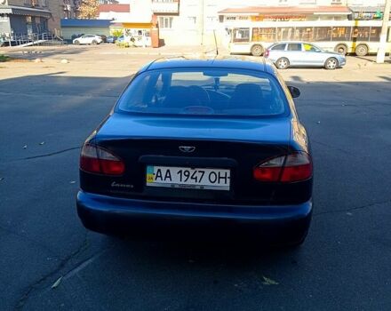 Черный Дэу Ланос, объемом двигателя 1.5 л и пробегом 365 тыс. км за 2000 $, фото 2 на Automoto.ua