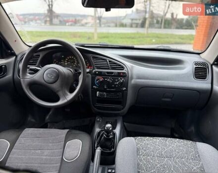Черный Дэу Ланос, объемом двигателя 1.5 л и пробегом 225 тыс. км за 2999 $, фото 24 на Automoto.ua