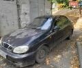 Черный Дэу Ланос, объемом двигателя 1.5 л и пробегом 170 тыс. км за 2000 $, фото 1 на Automoto.ua