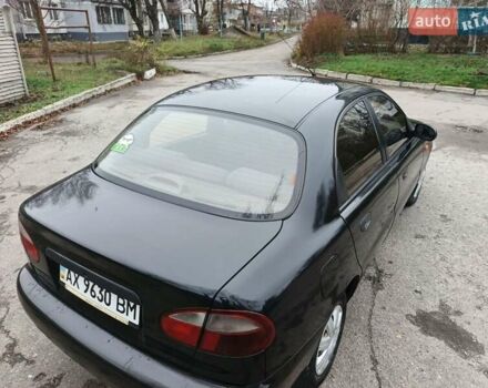 Черный Дэу Ланос, объемом двигателя 1.5 л и пробегом 240 тыс. км за 1800 $, фото 4 на Automoto.ua