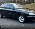 Черный Дэу Ланос, объемом двигателя 1.5 л и пробегом 153 тыс. км за 2550 $, фото 1 на Automoto.ua