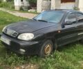 Чорний Деу Ланос, об'ємом двигуна 1.5 л та пробігом 200 тис. км за 1250 $, фото 1 на Automoto.ua
