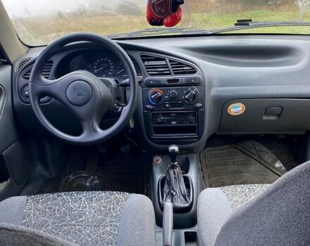 Чорний Деу Ланос, об'ємом двигуна 1.5 л та пробігом 256 тис. км за 1100 $, фото 12 на Automoto.ua