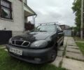 Черный Дэу Ланос, объемом двигателя 1.4 л и пробегом 109 тыс. км за 1900 $, фото 1 на Automoto.ua