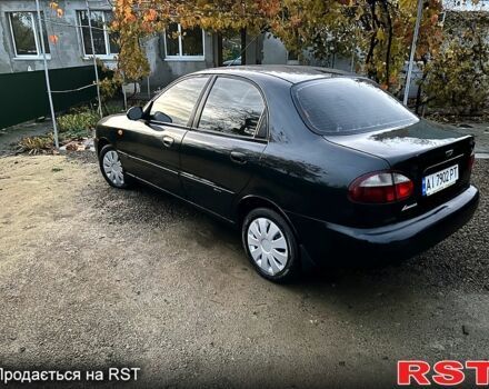 Черный Дэу Ланос, объемом двигателя 1.4 л и пробегом 220 тыс. км за 1800 $, фото 4 на Automoto.ua