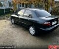 Черный Дэу Ланос, объемом двигателя 1.4 л и пробегом 220 тыс. км за 1800 $, фото 4 на Automoto.ua