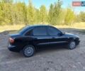 Черный Дэу Ланос, объемом двигателя 1.6 л и пробегом 160 тыс. км за 2700 $, фото 3 на Automoto.ua