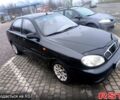 Черный Дэу Ланос, объемом двигателя 1.5 л и пробегом 220 тыс. км за 1000 $, фото 1 на Automoto.ua