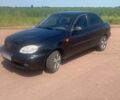 Черный Дэу Ланос, объемом двигателя 1.5 л и пробегом 227 тыс. км за 2350 $, фото 1 на Automoto.ua