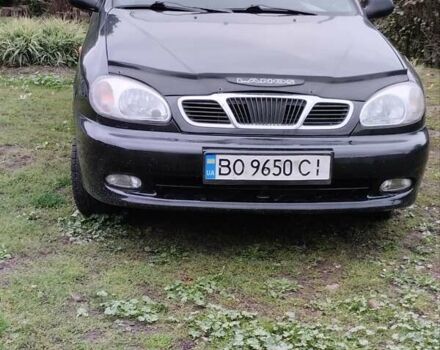 Черный Дэу Ланос, объемом двигателя 1.5 л и пробегом 250 тыс. км за 2200 $, фото 1 на Automoto.ua