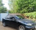 Черный Дэу Ланос, объемом двигателя 1.6 л и пробегом 239 тыс. км за 3200 $, фото 1 на Automoto.ua