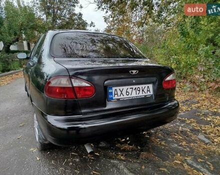 Черный Дэу Ланос, объемом двигателя 1.5 л и пробегом 350 тыс. км за 2000 $, фото 3 на Automoto.ua