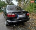 Черный Дэу Ланос, объемом двигателя 1.5 л и пробегом 350 тыс. км за 2000 $, фото 3 на Automoto.ua