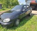Черный Дэу Ланос, объемом двигателя 1.4 л и пробегом 220 тыс. км за 1700 $, фото 1 на Automoto.ua