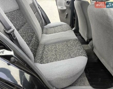 Черный Дэу Ланос, объемом двигателя 1.5 л и пробегом 128 тыс. км за 2999 $, фото 47 на Automoto.ua