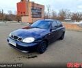Черный Дэу Ланос, объемом двигателя 1.5 л и пробегом 300 тыс. км за 1999 $, фото 1 на Automoto.ua