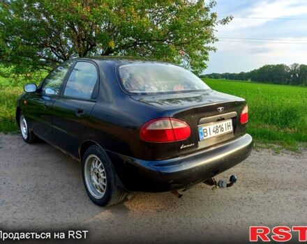 Черный Дэу Ланос, объемом двигателя 1.5 л и пробегом 368 тыс. км за 1150 $, фото 5 на Automoto.ua