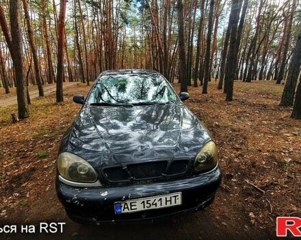Черный Дэу Ланос, объемом двигателя 1.4 л и пробегом 234 тыс. км за 1600 $, фото 11 на Automoto.ua