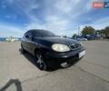 Черный Дэу Ланос, объемом двигателя 1.6 л и пробегом 137 тыс. км за 3600 $, фото 2 на Automoto.ua