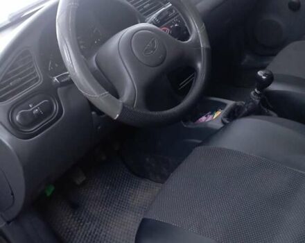 Чорний Деу Ланос, об'ємом двигуна 1.5 л та пробігом 184 тис. км за 3000 $, фото 2 на Automoto.ua