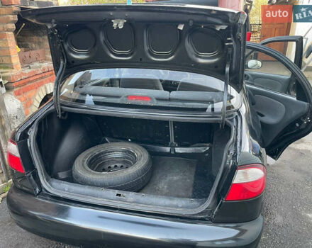 Чорний Деу Ланос, об'ємом двигуна 1.5 л та пробігом 100 тис. км за 3000 $, фото 11 на Automoto.ua