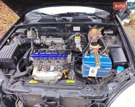 Черный Дэу Ланос, объемом двигателя 1.5 л и пробегом 180 тыс. км за 2300 $, фото 17 на Automoto.ua