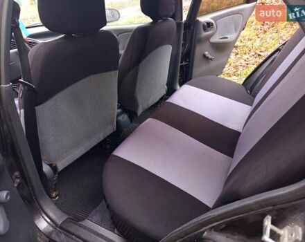 Черный Дэу Ланос, объемом двигателя 1.5 л и пробегом 180 тыс. км за 2300 $, фото 4 на Automoto.ua