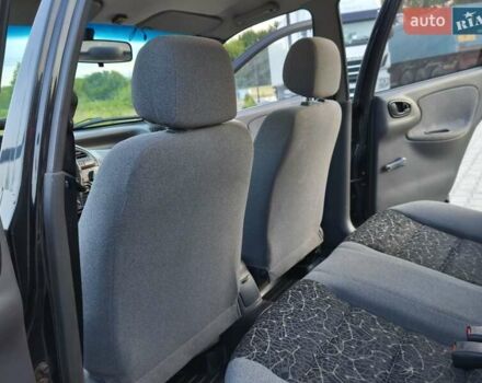 Черный Дэу Ланос, объемом двигателя 1.4 л и пробегом 120 тыс. км за 3100 $, фото 11 на Automoto.ua
