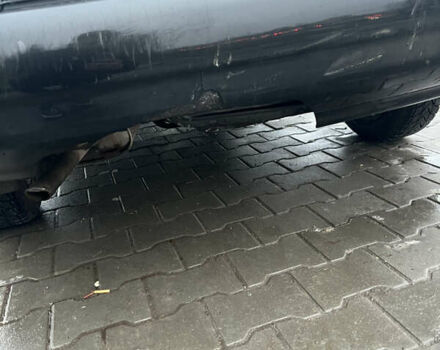 Черный Дэу Ланос, объемом двигателя 1.5 л и пробегом 161 тыс. км за 1950 $, фото 17 на Automoto.ua