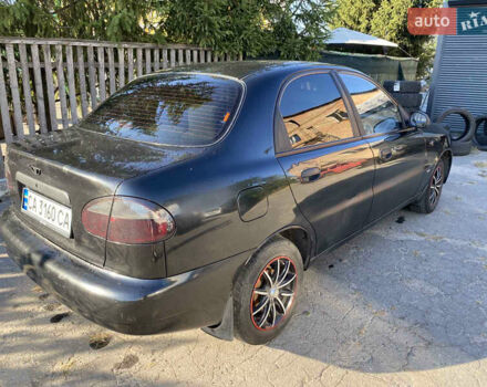 Черный Дэу Ланос, объемом двигателя 1.5 л и пробегом 250 тыс. км за 2300 $, фото 4 на Automoto.ua