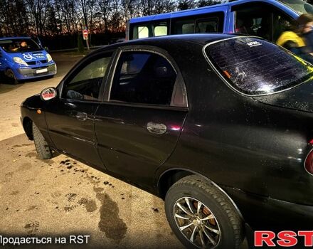 Черный Дэу Ланос, объемом двигателя 1.5 л и пробегом 292 тыс. км за 2300 $, фото 2 на Automoto.ua