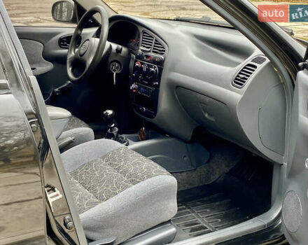 Чорний Деу Ланос, об'ємом двигуна 1.5 л та пробігом 198 тис. км за 2600 $, фото 27 на Automoto.ua