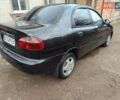 Черный Дэу Ланос, объемом двигателя 1.5 л и пробегом 200 тыс. км за 2100 $, фото 4 на Automoto.ua