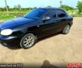 Черный Дэу Ланос, объемом двигателя 1.5 л и пробегом 140 тыс. км за 3100 $, фото 1 на Automoto.ua