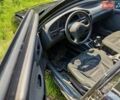 Черный Дэу Ланос, объемом двигателя 1.5 л и пробегом 100 тыс. км за 2400 $, фото 4 на Automoto.ua
