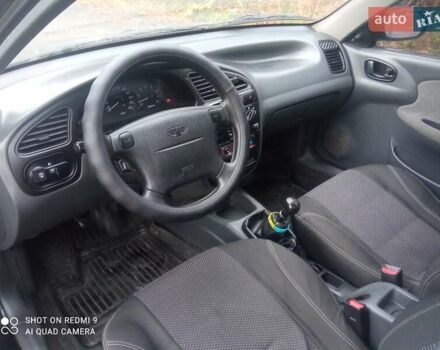 Чорний Деу Ланос, об'ємом двигуна 1.6 л та пробігом 230 тис. км за 1750 $, фото 3 на Automoto.ua