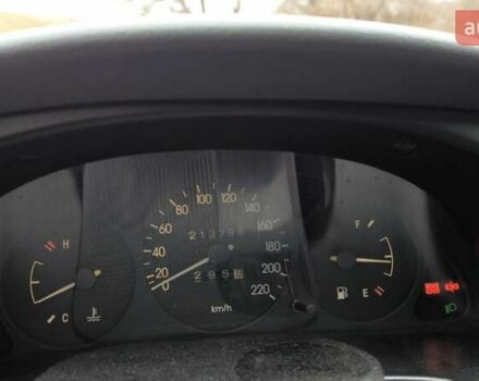 Черный Дэу Ланос, объемом двигателя 1.39 л и пробегом 213 тыс. км за 2300 $, фото 6 на Automoto.ua