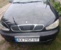 Чорний Деу Ланос, об'ємом двигуна 1.5 л та пробігом 146 тис. км за 2400 $, фото 1 на Automoto.ua