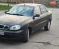 Черный Дэу Ланос, объемом двигателя 1.5 л и пробегом 160 тыс. км за 1900 $, фото 1 на Automoto.ua