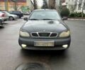 Чорний Деу Ланос, об'ємом двигуна 1.5 л та пробігом 137 тис. км за 2350 $, фото 1 на Automoto.ua