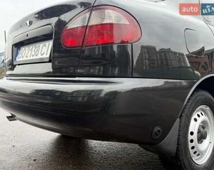 Черный Дэу Ланос, объемом двигателя 1.5 л и пробегом 128 тыс. км за 2999 $, фото 24 на Automoto.ua