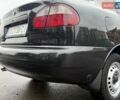 Черный Дэу Ланос, объемом двигателя 1.5 л и пробегом 128 тыс. км за 2999 $, фото 24 на Automoto.ua