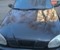 Черный Дэу Ланос, объемом двигателя 1.5 л и пробегом 195 тыс. км за 2400 $, фото 1 на Automoto.ua